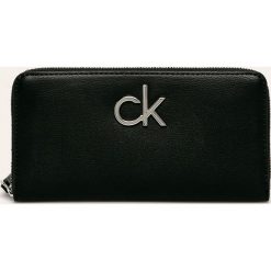 Calvin Klein - Portfel. Czarne portfele damskie Calvin Klein, bez wzorów, ze skóry ekologicznej. Za 339,90 zł.
