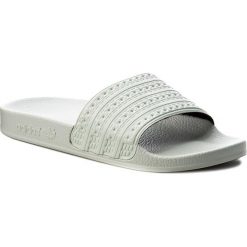 Klapki adidas - adilette BA7540 Lingrn/Lingrn/Lingrn. Zielone klapki damskie Adidas, bez wzorów, z tworzywa sztucznego, bez obcasa. W wyprzedaży za 109,00 zł.