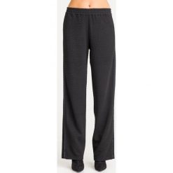 SPODNIE Emporio Armani. Czarne spodnie damskie Emporio Armani. Za 785,40 zł.