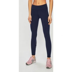 New Balance - Legginsy. Niebieskie spodnie damskie New Balance, s, bez wzorów, z elastanu. W wyprzedaży za 159,90 zł.