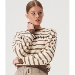 Bluza w paski z napisem - Kremowy. Białe bluzy damskie Sinsay, s, w paski, bez rękawów, bez kaptura. W wyprzedaży za 29,99 zł.