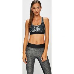 Under Armour - Biustonosz. Szare biustonosze sportowe damskie marki Under Armour, xs, z elastanu. W wyprzedaży za 119,90 zł.