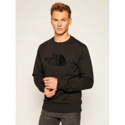 Bluza The North Face Drew Peak Crew NF0A4SVRJK31. Czarne bluzy męskie The North Face, s, bez wzorów, bez kołnierzyka, bez rękawów, bez kaptura. Za 299,00 zł.