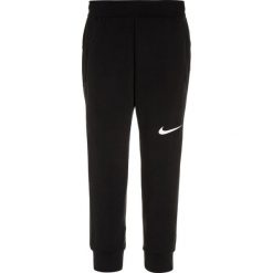 Nike Performance DRY HYPER FLEECE Spodnie treningowe black/white. Czarne spodnie chłopięce Nike Performance, z elastanu. W wyprzedaży za 129,35 zł.