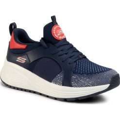 Sneakersy SKECHERS - Metro Daisy 117013/NVOR Navy/Orange. Niebieskie półbuty damskie Skechers, bez wzorów, ze skóry ekologicznej, bez obcasa, na płaskiej podeszwie, bez zapięcia. Za 279,00 zł.