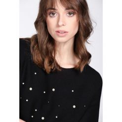 Czarny Sweter Animal Print. Czarne swetry klasyczne damskie marki Born2be, l, z okrągłym kołnierzem. Za 64,99 zł.