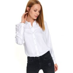 Klasyczna koszula z długim rękawem. Białe koszule damskie Top Secret, do pracy, na zimę, z aplikacjami, z bawełny, eleganckie, z klasycznym kołnierzykiem, z długim rękawem. W wyprzedaży za 59,99 zł.