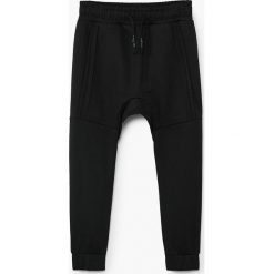 Mango Kids - Spodnie dziecięce Roger 110-164 cm. Czarne spodnie chłopięce marki Mango Kids, z bawełny. Za 69,90 zł.