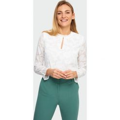 Bluzka z riuszką. Koszule damskie Greenpoint, bez wzorów, z poliesteru, bez kołnierzyka, bez rękawów. Za 99,99 zł.