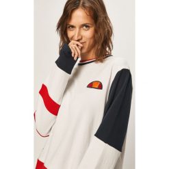 Ellesse - Bluza. Białe bluzy damskie Ellesse, z aplikacjami, z bawełny, bez rękawów, bez kaptura. W wyprzedaży za 219,90 zł.