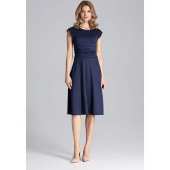 Elegancka Granatowa Rozkloszowana Sukienka z Zaznaczoną Talią. Niebieskie sukienki damskie Molly.pl, na co dzień, s, bez wzorów, eleganckie, z okrągłym kołnierzem, bez rękawów, mini, rozkloszowane. Za 179,90 zł.