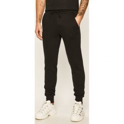 Puma - Spodnie. Czarne spodnie męskie Puma, s, bez wzorów, z elastanu. Za 219,90 zł.