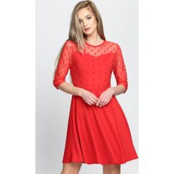 Czerwona Sukienka Love Dance. Czerwone sukienki damskie Born2be, s, bez wzorów, z poliesteru, wizytowe, bez kołnierzyka, bez rękawów. Za 59,99 zł.
