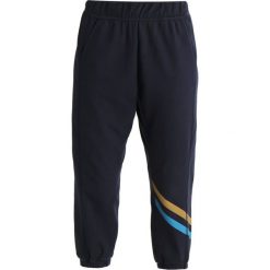LNDR COOL DOWN TRACKS Spodnie treningowe navy. Niebieskie bryczesy damskie marki LNDR, l, z elastanu. Za 759,00 zł.