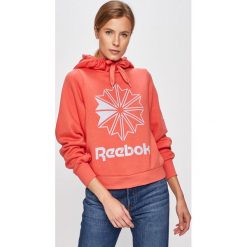 Reebok Classic - Bluza. Różowe bluzy damskie Reebok Classic, s, z nadrukiem, z elastanu, bez rękawów, z kapturem. W wyprzedaży za 199,90 zł.