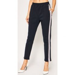 Spodnie dresowe TOMMY HILFIGER Raven WW0WW26679. Białe spodnie damskie TOMMY HILFIGER, m, z bawełny. W wyprzedaży za 399,00 zł.