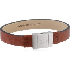 Skórzana bransoletka "Casuc". Pomarańczowe bransoletki damskie TOMMY HILFIGER, ze skóry, ze stali. W wyprzedaży za 179,95 zł.