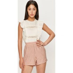 Tally Weijl - Bluzka. Czarne bluzki damskie TALLY WEIJL, s, bez wzorów, z bawełny, casualowe, z okrągłym kołnierzem, bez rękawów. Za 79,90 zł.