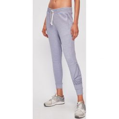 Reebok - Spodnie. Niebieskie spodnie damskie Reebok, s, bez wzorów, z elastanu. Za 169,90 zł.