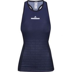 Top ADIDAS BY STELLA McCARTNEY TRAIN MIRACLE Print|Granatowy. Niebieskie topy damskie marki adidas by Stella McCartney, z kontrastowym kołnierzykiem. Za 246,00 zł.
