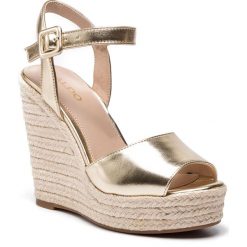 Espadryle ALDO - Ybelani 59191243 82. Żółte espadryle damskie ALDO, bez wzorów, ze skóry ekologicznej, bez obcasa, na obcasie. W wyprzedaży za 319,00 zł.
