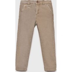Blukids - Spodnie dziecięce 104-134 cm. Brązowe spodnie chłopięce Blukids, bez wzorów, z elastanu, casualowe. W wyprzedaży za 59,90 zł.