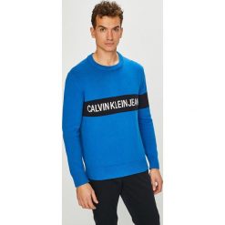 Calvin Klein Jeans - Sweter. Niebieskie swetry klasyczne męskie marki Calvin Klein Jeans, s, z bawełny, z okrągłym kołnierzem. Za 539,90 zł.
