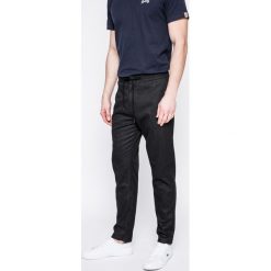 Guess Jeans - Spodnie. Czarne jeansy męskie Guess Jeans, na co dzień, m, z haftami, z elastanu, casualowe. W wyprzedaży za 199,90 zł.