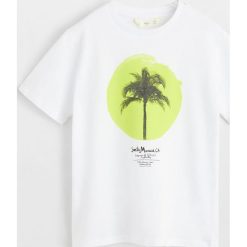 Mango Kids - T-shirt dziecięcy Monica 110-164 cm. Białe t-shirty chłopięce Mango Kids, z nadrukiem, z bawełny, bez rękawów. W wyprzedaży za 29,90 zł.