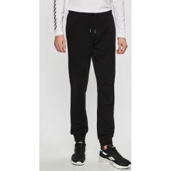 Fila - Spodnie. Szare spodnie męskie Fila, na co dzień, s, bez wzorów, z bawełny, casualowe. W wyprzedaży za 179,90 zł.
