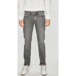 Tommy Hilfiger - Jeansy Bleecker. Szare jeansy męskie TOMMY HILFIGER, bez wzorów, z obniżonym stanem. W wyprzedaży za 329,90 zł.