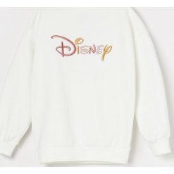 Bluza z aplikacją DIsney - Kremowy. Białe bluzy damskie Reserved, z aplikacjami, bez rękawów, bez kaptura. Za 79,99 zł.