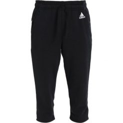 Spodnie dresowe damskie: adidas Performance Rybaczki sportowe noir/blanc