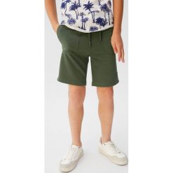 Mango Kids - Szorty Hugo. Żółte spodenki chłopięce Mango Kids, bez wzorów, z bawełny, casualowe. Za 45,90 zł.