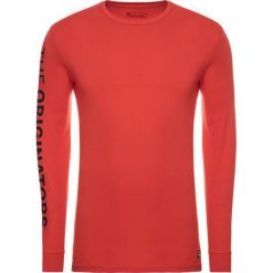 Koszulka techniczna Under Armour Originators Of Performance 1346681. Czerwone koszulki męskie Under Armour, m, bez wzorów, z bawełny, sportowe, polo, bez rękawów. Za 129,00 zł.