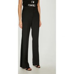 Tommy Hilfiger - Spodnie. Czarne spodnie damskie TOMMY HILFIGER, bez wzorów, z elastanu. W wyprzedaży za 359,90 zł.