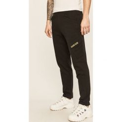 Calvin Klein Performance - Spodnie. Czarne spodnie męskie Calvin Klein Performance, na co dzień, s, bez wzorów, z bawełny. Za 399,90 zł.