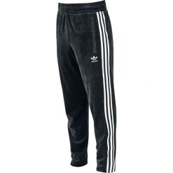 Adidas Cozy Pant Spodnie dresowe czarny/biały. Czarne spodnie dresowe męskie marki Adidas, l, w paski, z dresówki. Za 324,90 zł.