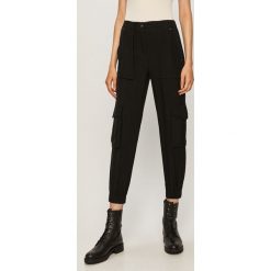 AllSaints - Spodnie Frieda Trousers. Czarne spodnie damskie AllSaints, s, bez wzorów, z tkaniny. W wyprzedaży za 459,90 zł.