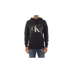 Bluzy Calvin Klein Jeans J30J307745 MONOGRAM BOX LOGO. Niebieskie bluzy męskie Calvin Klein Jeans, s, bez wzorów, z jeansu, bez kołnierzyka, bez rękawów, bez kaptura. Za 397,52 zł.