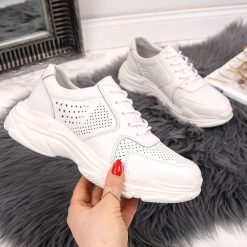 Buty sportowe damskie skórzane ażurowe białe Filippo - biały. Białe buty sportowe damskie FILIPPO, bez wzorów, sportowe. Za 149,99 zł.