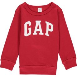 Bluza w kolorze czerwonym. Czerwone bluzy niemowlęce Gap Kids, z nadrukiem, bez rękawów, bez kaptura. W wyprzedaży za 59,95 zł.
