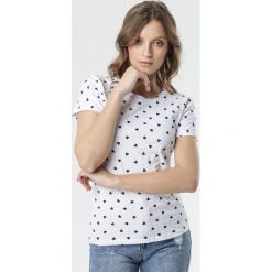 Biały T-shirt Axiphiche. Białe bluzki damskie Born2be, s, bez wzorów, bez kołnierzyka, z krótkim rękawem. Za 39,99 zł.