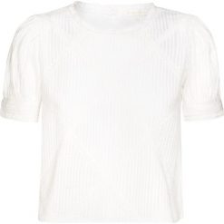 Top LOVESHACKFANCY ADDIE. Białe topy damskie LoveShackFancy, w koronkowe wzory, z bawełny, z okrągłym kołnierzem. W wyprzedaży za 930,00 zł.