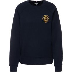 Bluza TOMMY HILFIGER Essential WW0WW25563. Niebieskie bluzy damskie TOMMY HILFIGER, s, bez wzorów, z bawełny, bez rękawów, bez kaptura. W wyprzedaży za 259,00 zł.