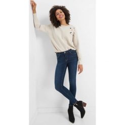 Jeansy skinny. Niebieskie rurki damskie Orsay, z elastanu. W wyprzedaży za 120,00 zł.