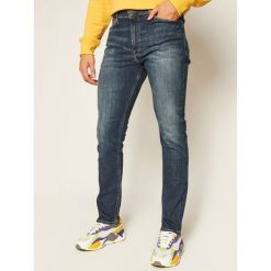 Jeansy Skinny Fit Tommy Jeans Simon DM0DM08242. Niebieskie jeansy męskie Tommy Jeans, m, bez wzorów. Za 449,00 zł.