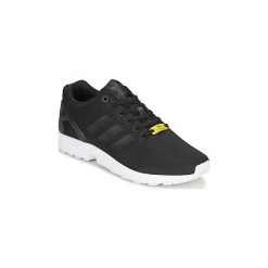 Buty adidas ZX FLUX. Czarne trampki i tenisówki damskie Adidas, bez wzorów, bez zapięcia. Za 335,20 zł.