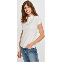 Lacoste - Top. Czarne bluzki damskie Lacoste, bez wzorów, z elastanu, bez kołnierzyka. W wyprzedaży za 269,90 zł.