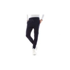 Spodnie treningowe Fila 681095 CLASSIC PURE SLIM. Czarne spodnie męskie Fila, s, bez wzorów. Za 200,29 zł.